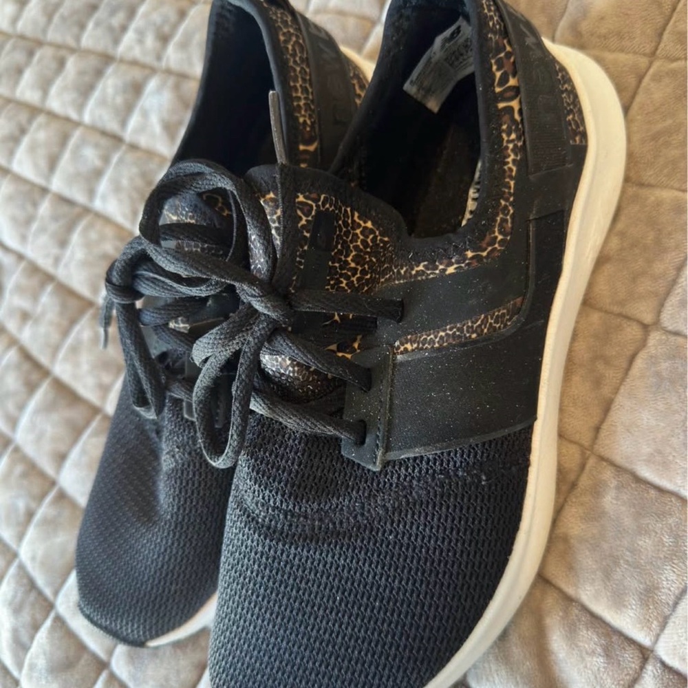 New Balance Black Athletic Sneakers with Leopard Accent